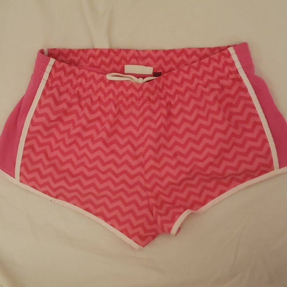 Pink running shorts